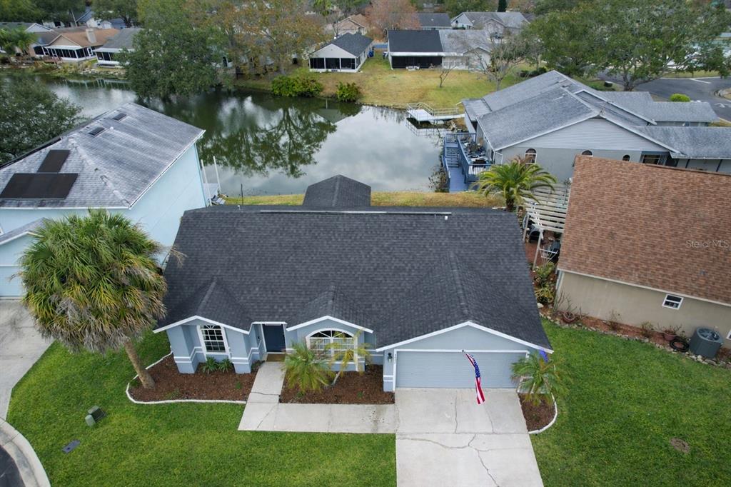 2022 Hatteras Point Lakeland, FL 33813 - Photo 2 of 36 an aerial view of a house with swimming pool and big yard