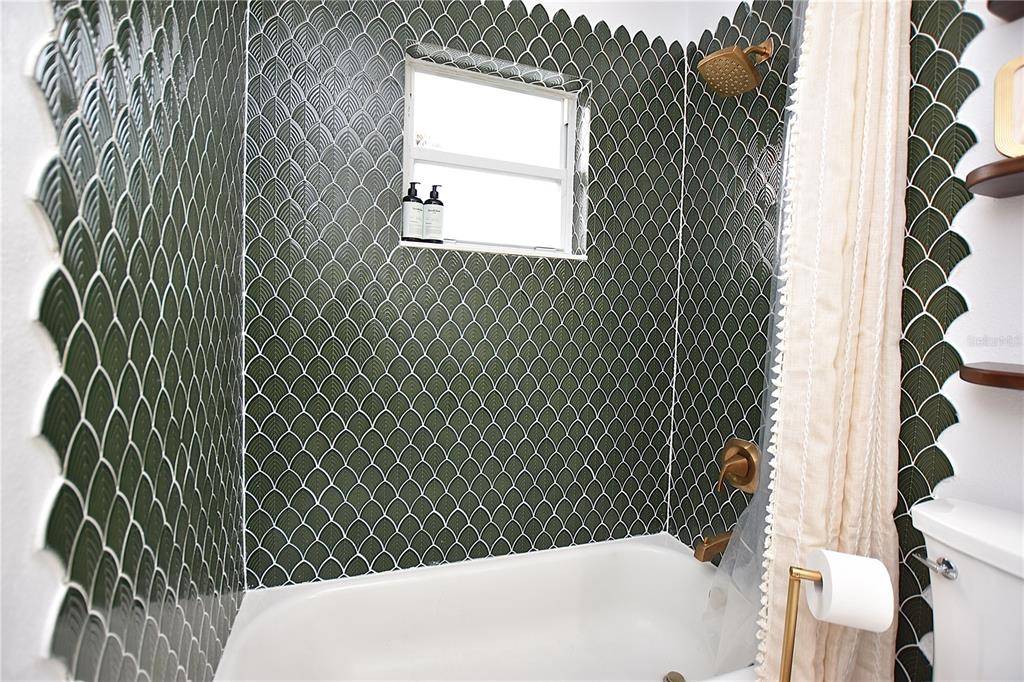 2022 Hatteras Point Lakeland, FL 33813 - Photo 26 of 36 a bathroom with a sink and mirror