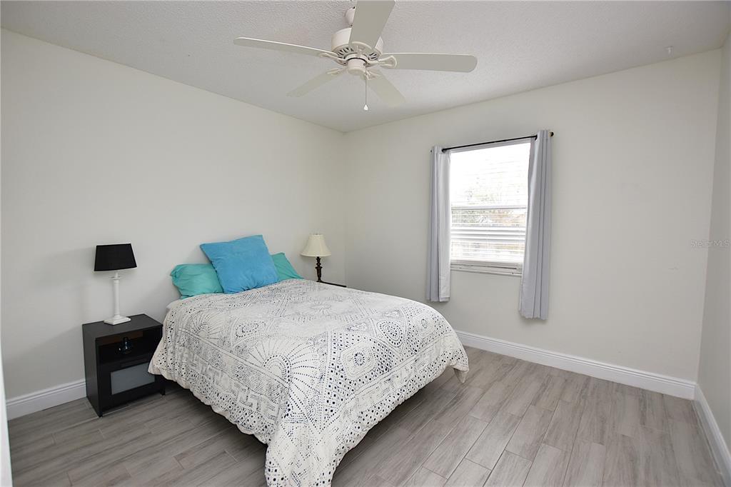 2022 Hatteras Point Lakeland, FL 33813 - Photo 29 of 36 a bedroom with a bed and a window