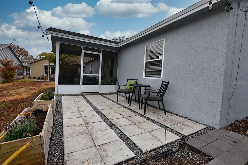 2022 Hatteras Point Lakeland, FL 33813 - Photo 32 of 36 a balcony with table and chairs