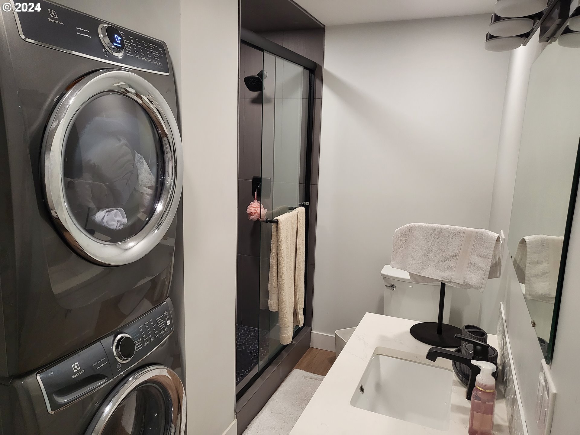 949 Southeast 221st Avenue Gresham, OR 97030 - Photo 13 of 19 a view of a storage and utility room with a washer dryer