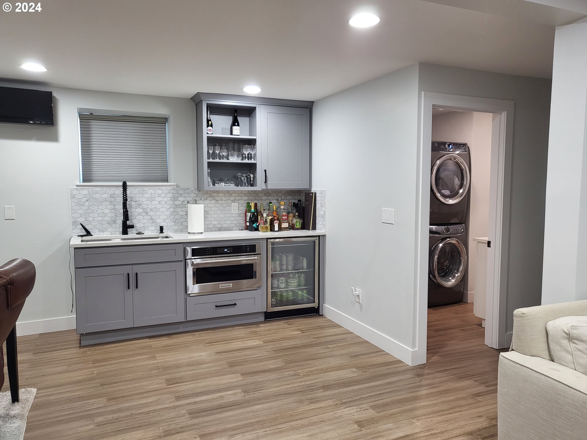 949 Southeast 221st Avenue Gresham, OR 97030 - Photo 9 of 19 a kitchen with a refrigerator and a stove top oven