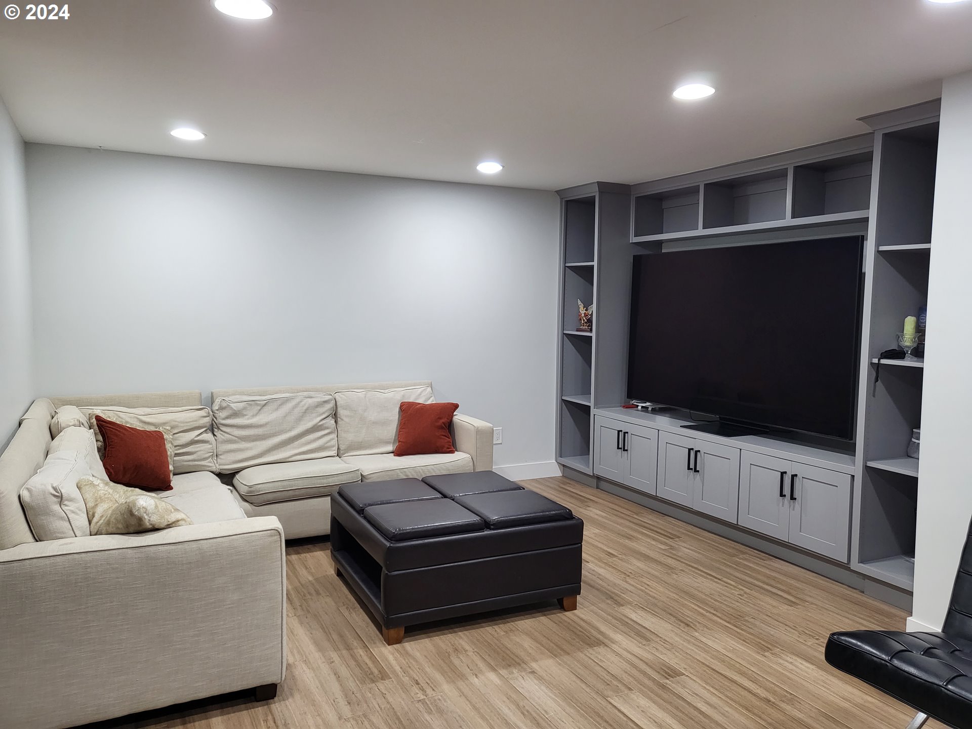 949 Southeast 221st Avenue Gresham, OR 97030 - Photo 10 of 19 a living room with furniture and a flat screen tv