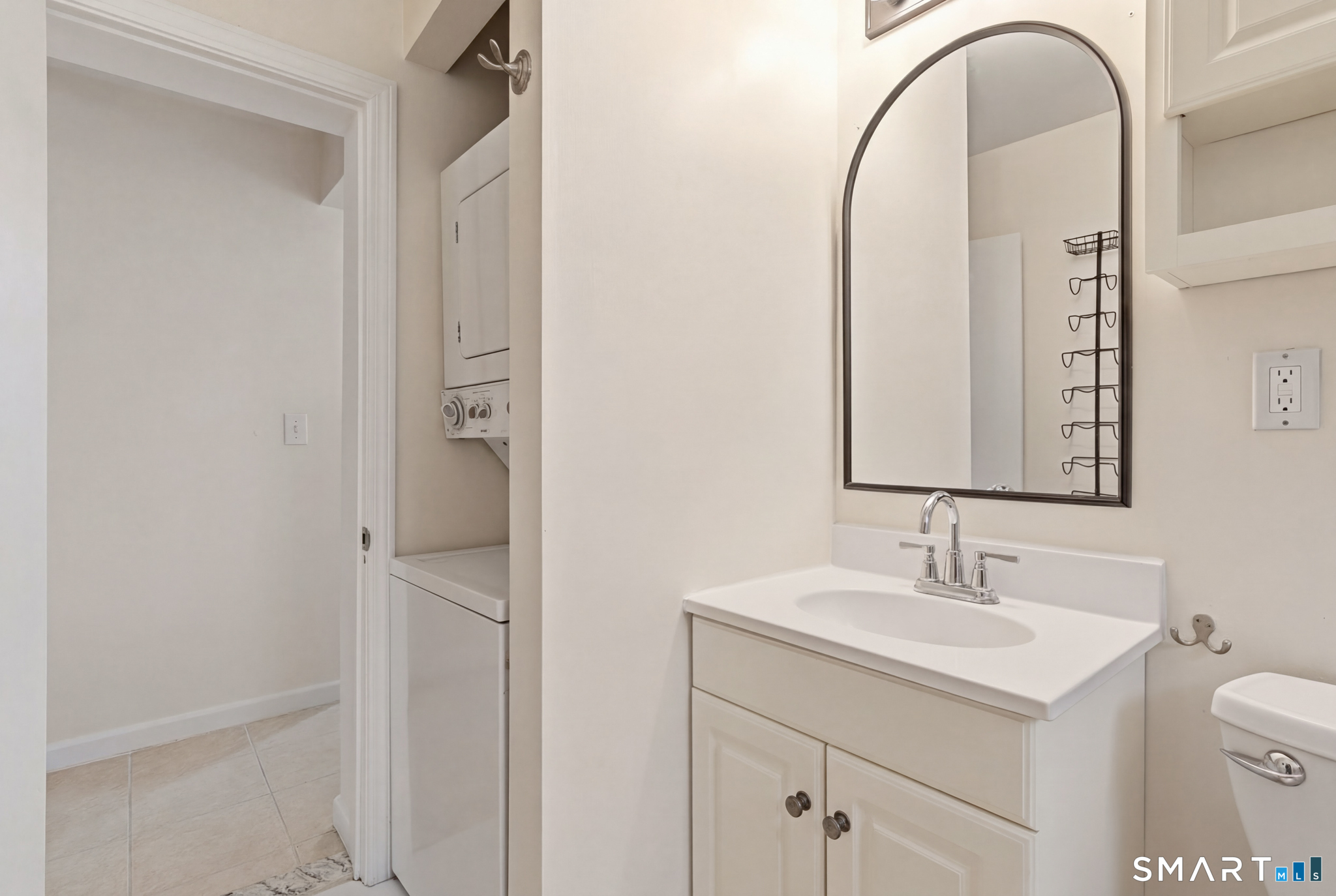 1565 Byam Road Cheshire, CT 06410 - Photo 10 of 18 a bathroom with a sink and a mirror