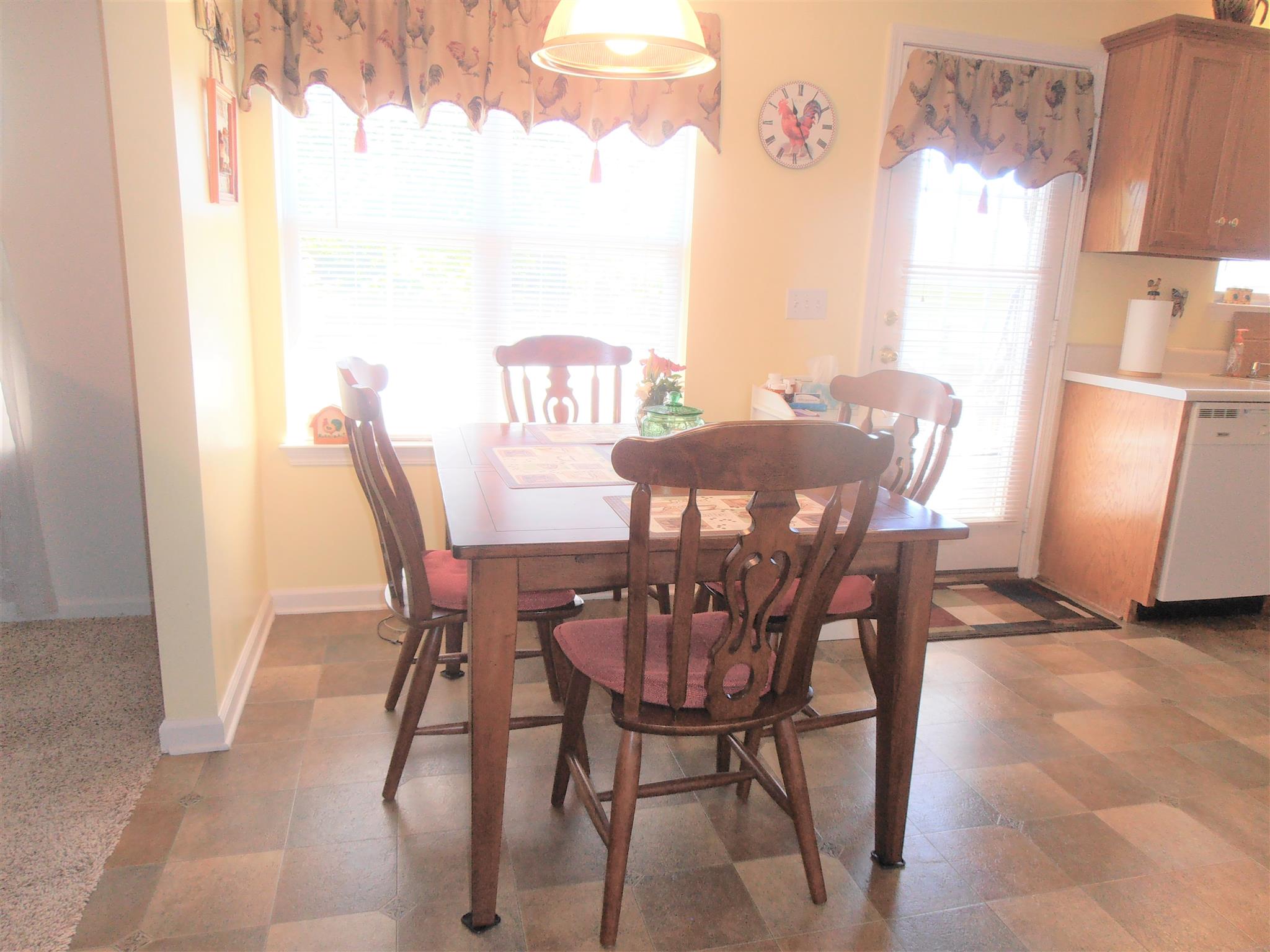 1141 Woods Ferry Road Lebanon, TN 37087 - Photo 15 of 30 a view of a dining room with furniture and wooden floor