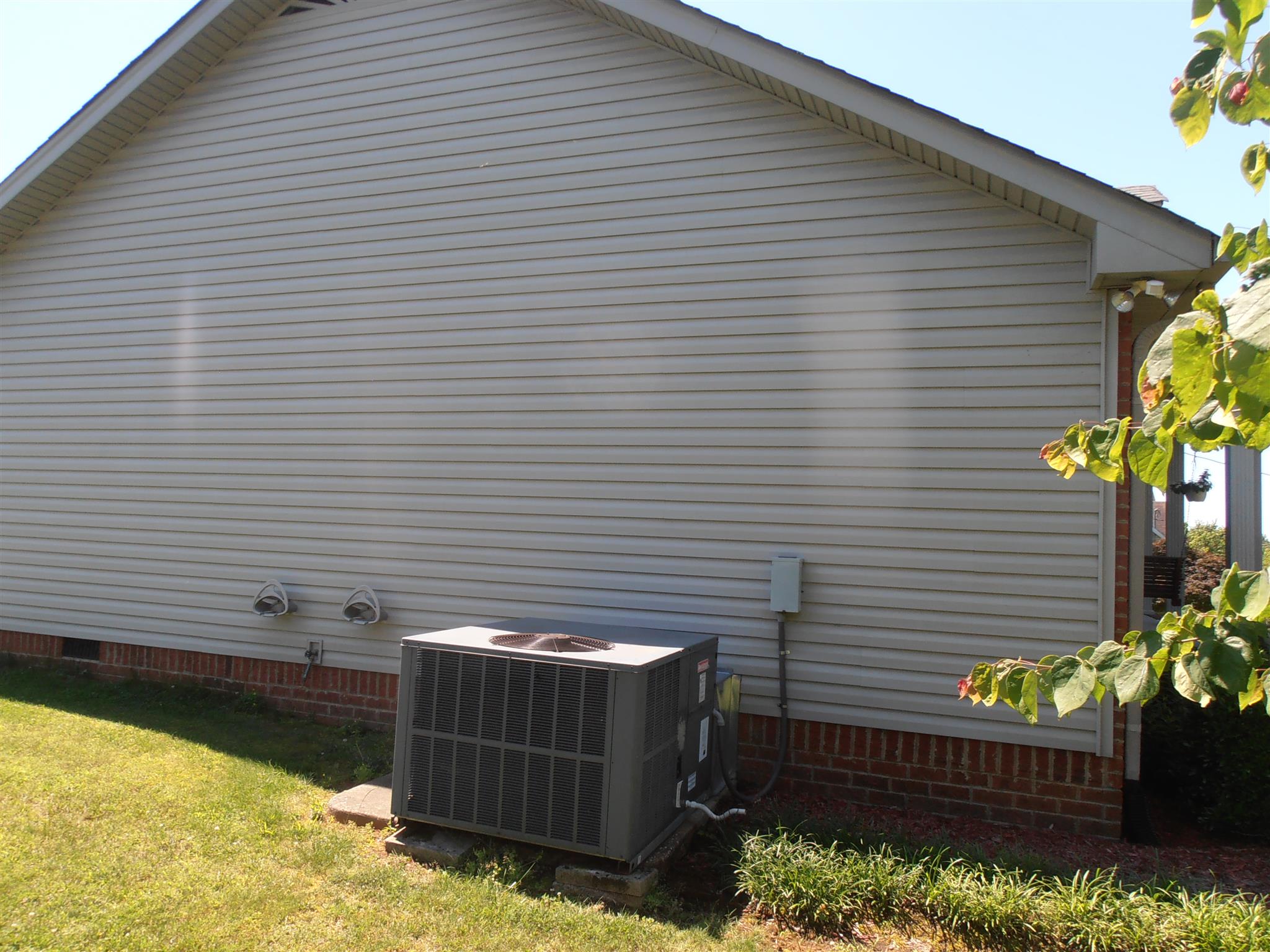 1141 Woods Ferry Road Lebanon, TN 37087 - Photo 2 of 30 a view of a backyard with chairs and potted plants