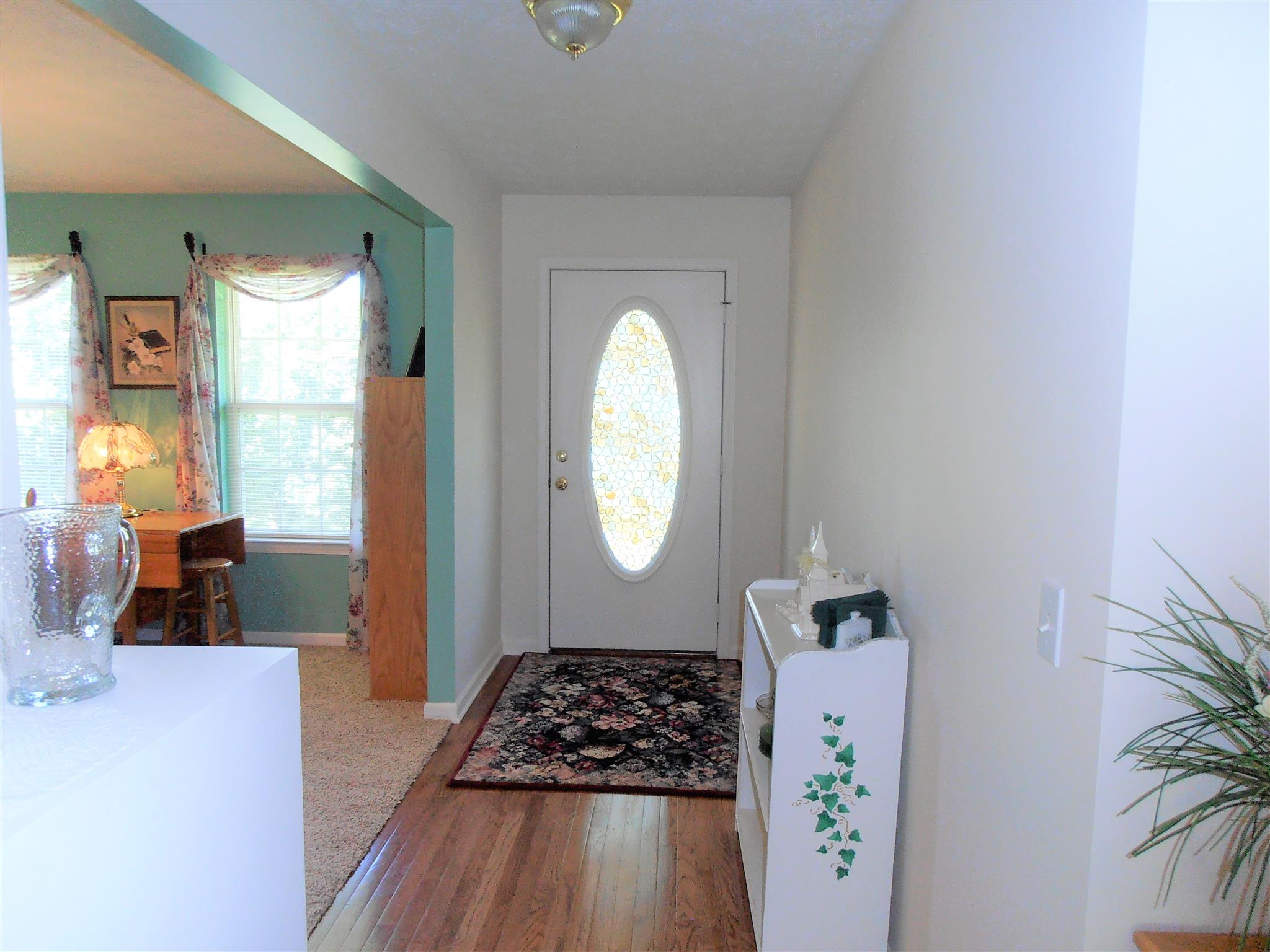 1141 Woods Ferry Road Lebanon, TN 37087 - Photo 6 of 30 a bedroom with a bed and wooden floor