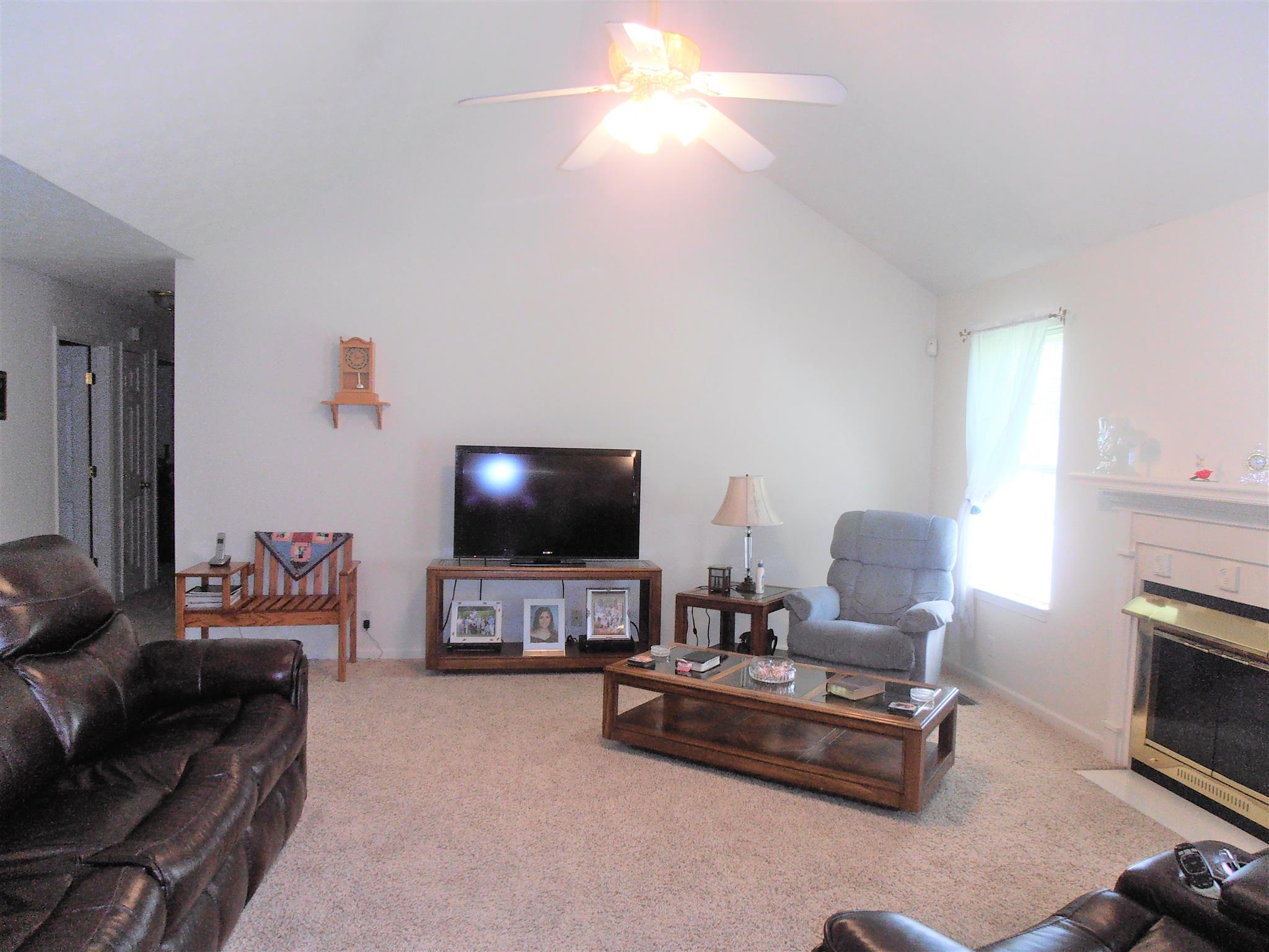 1141 Woods Ferry Road Lebanon, TN 37087 - Photo 7 of 30 a living room with furniture and a flat screen tv