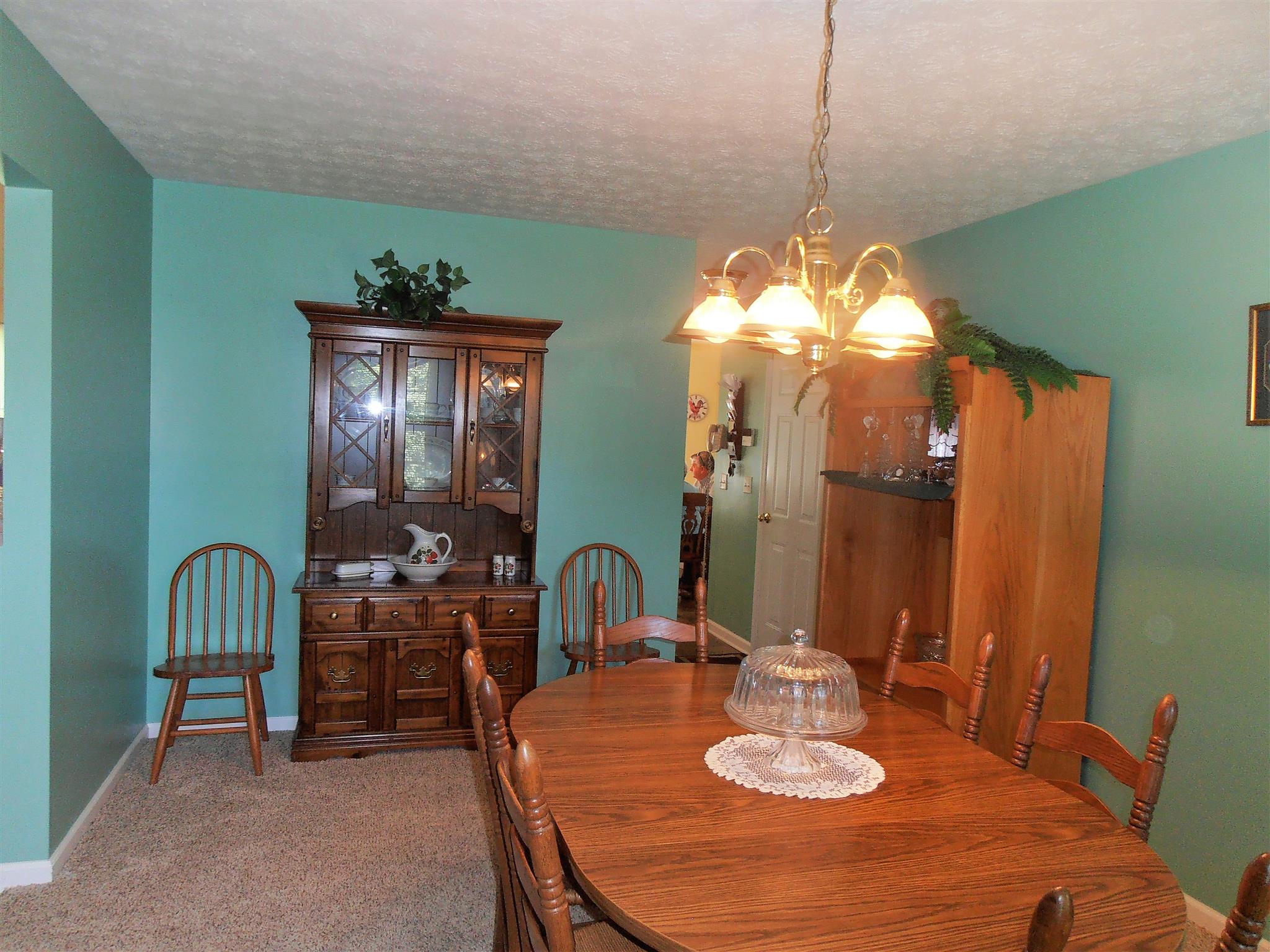 1141 Woods Ferry Road Lebanon, TN 37087 - Photo 10 of 30 a dining room with furniture and a mirror