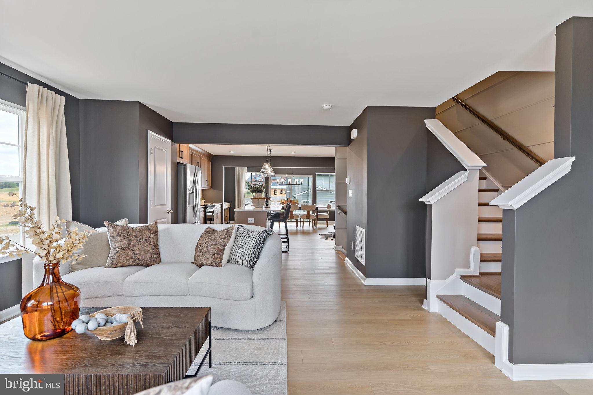 275 Nymph Road Inwood, WV 25428 - Photo 13 of 36 a living room with furniture and wooden floor