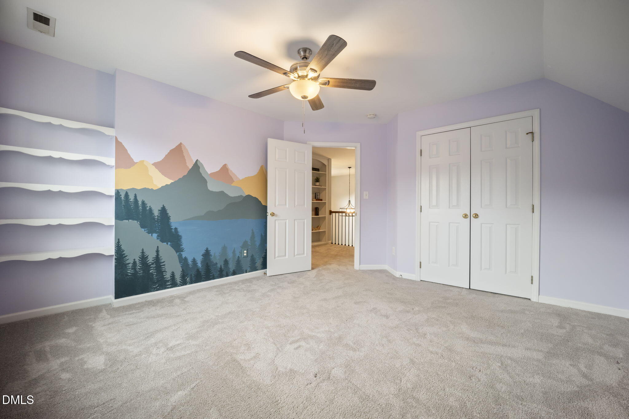 8665 Harps Mill Road Raleigh, NC 27615 - Photo 24 of 36 a view of an empty room with a ceiling fan