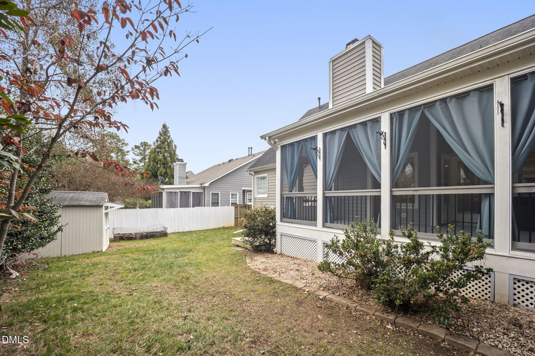 8665 Harps Mill Road Raleigh, NC 27615 - Photo 33 of 36 a front view of a house with garden