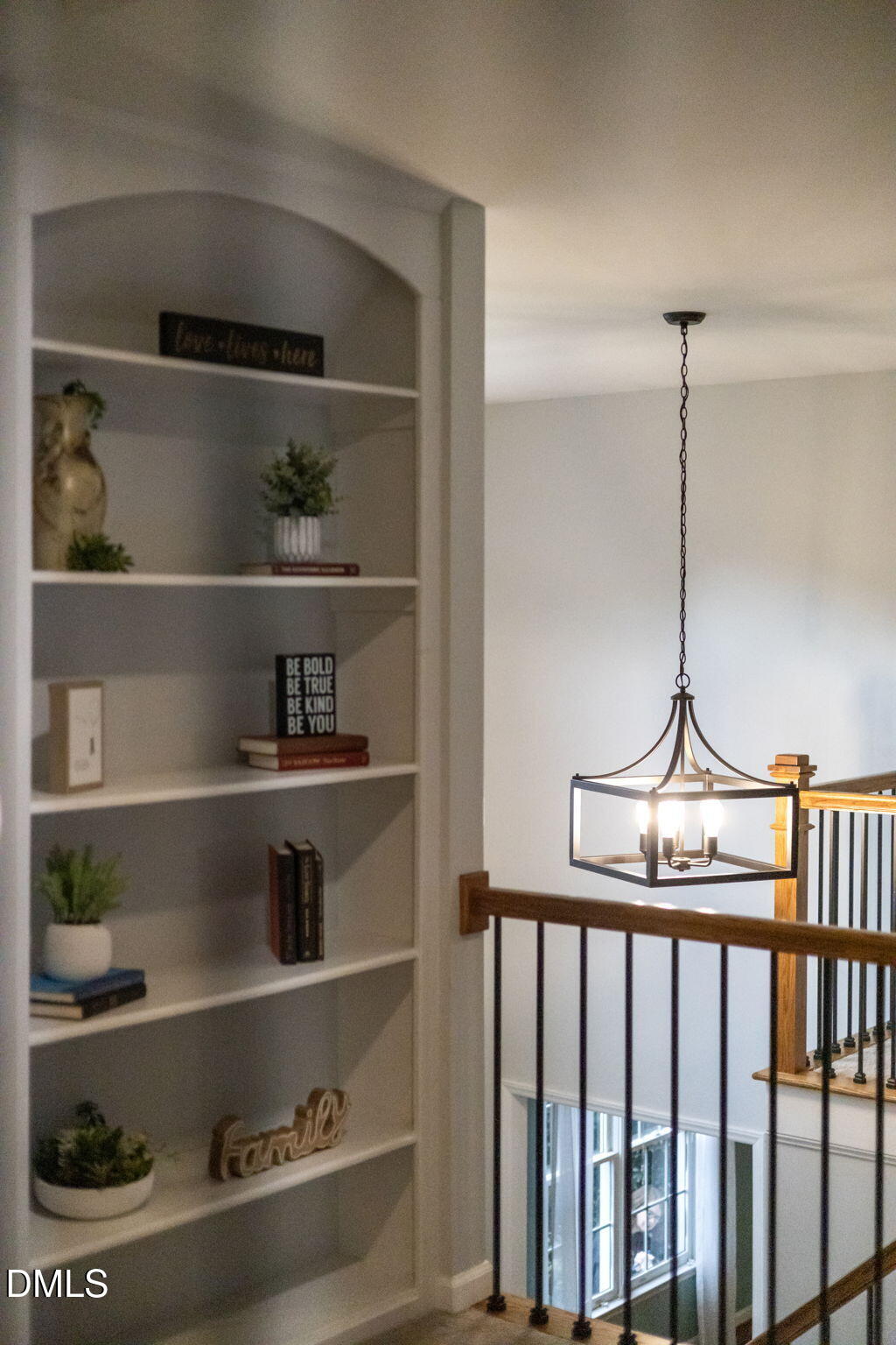8665 Harps Mill Road Raleigh, NC 27615 - Photo 5 of 36 a view of a racks on the shelf