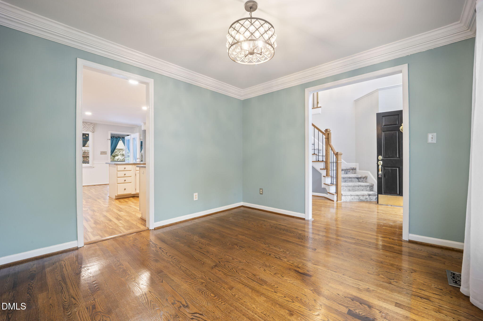 8665 Harps Mill Road Raleigh, NC 27615 - Photo 6 of 36 wooden floor in an empty room