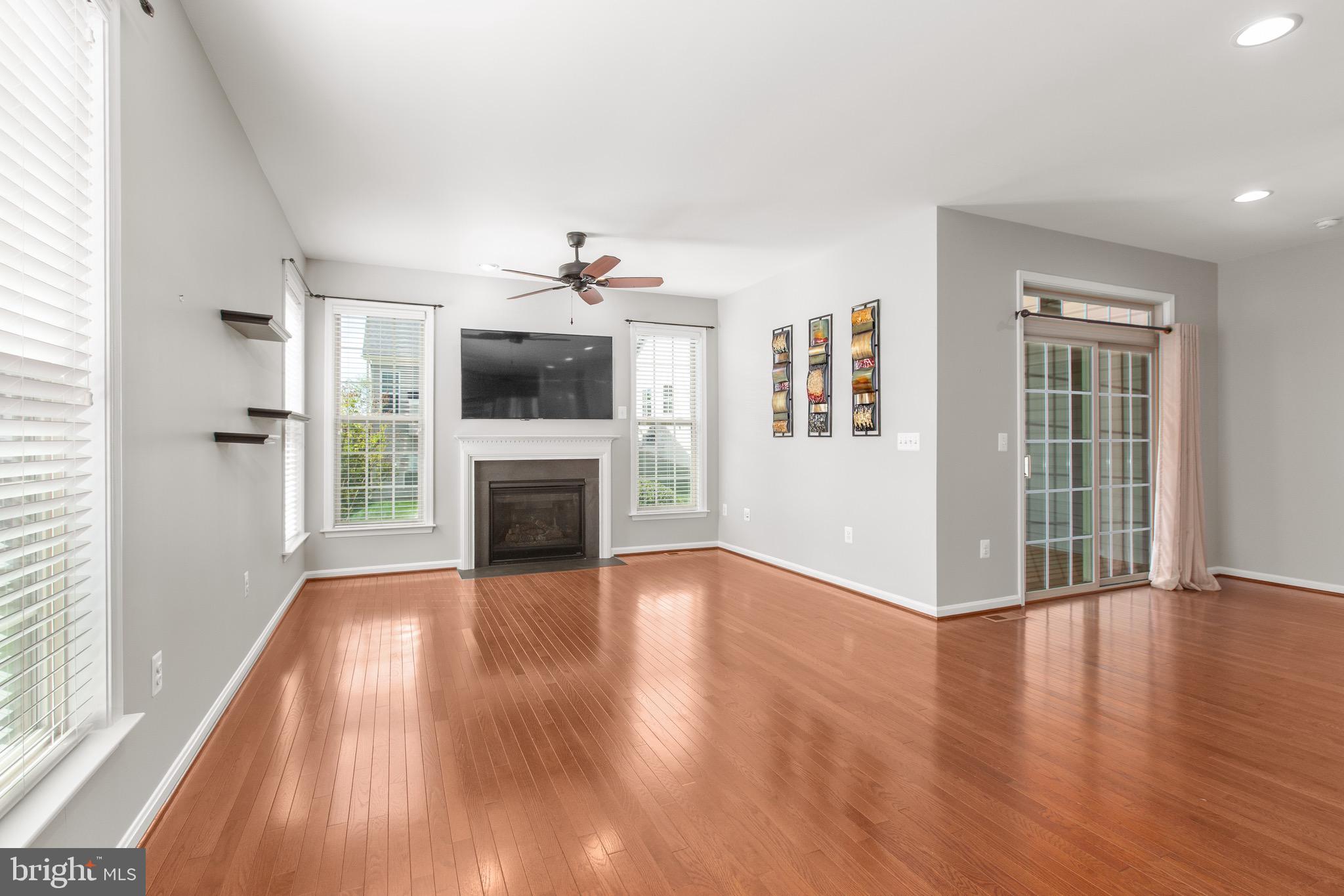 6016 East Greenbrier River Road Fredericksburg, VA 22407 - Photo 17 of 46 Family Room w/Stunning Wood Floors & Gas Fireplace