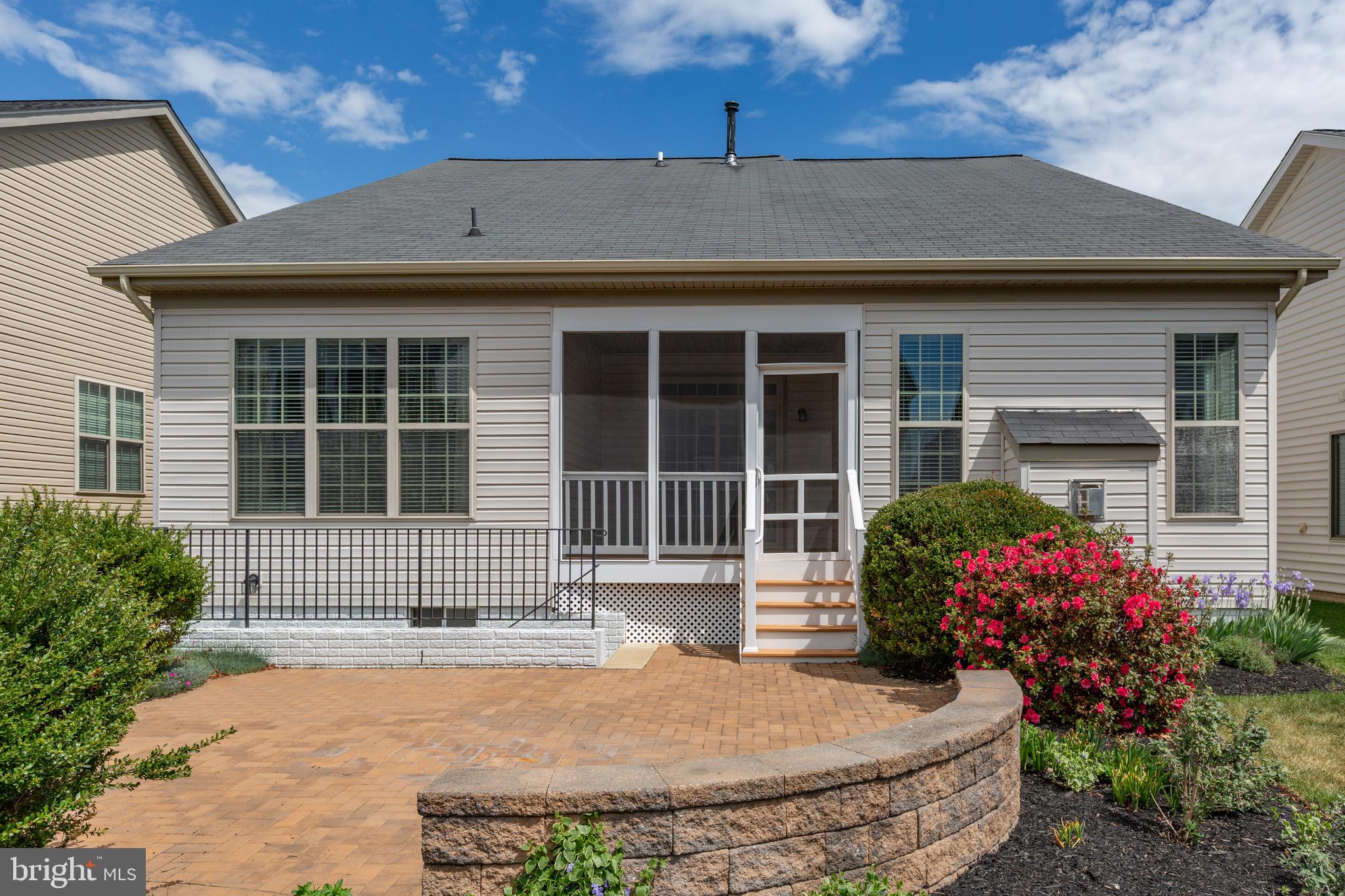 6016 East Greenbrier River Road Fredericksburg, VA 22407 - Photo 41 of 46 Custom Paved Patio with Lighted Stone Wall