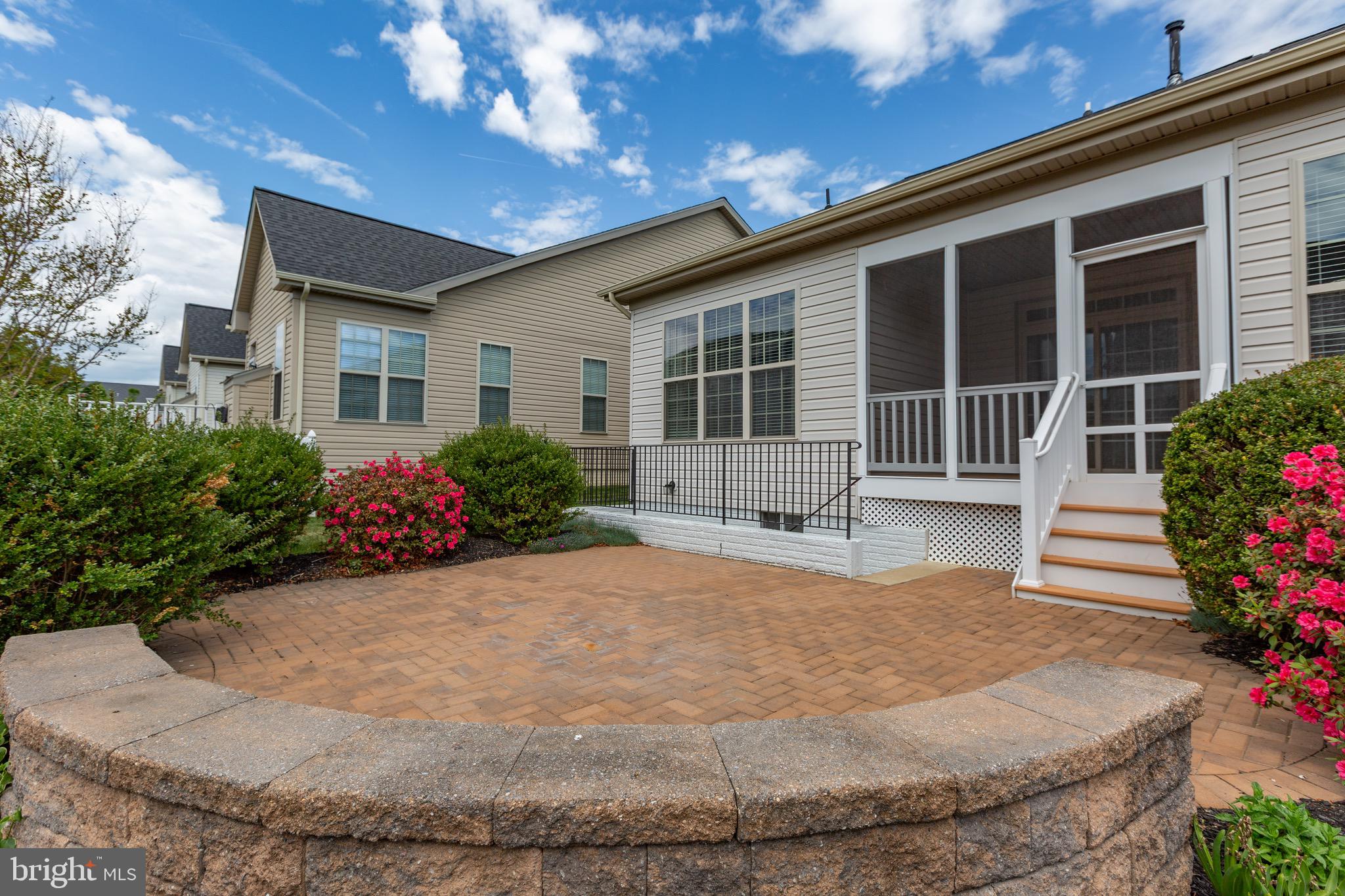 6016 East Greenbrier River Road Fredericksburg, VA 22407 - Photo 42 of 46 Custom Paved Patio with Lighted Stone Wall