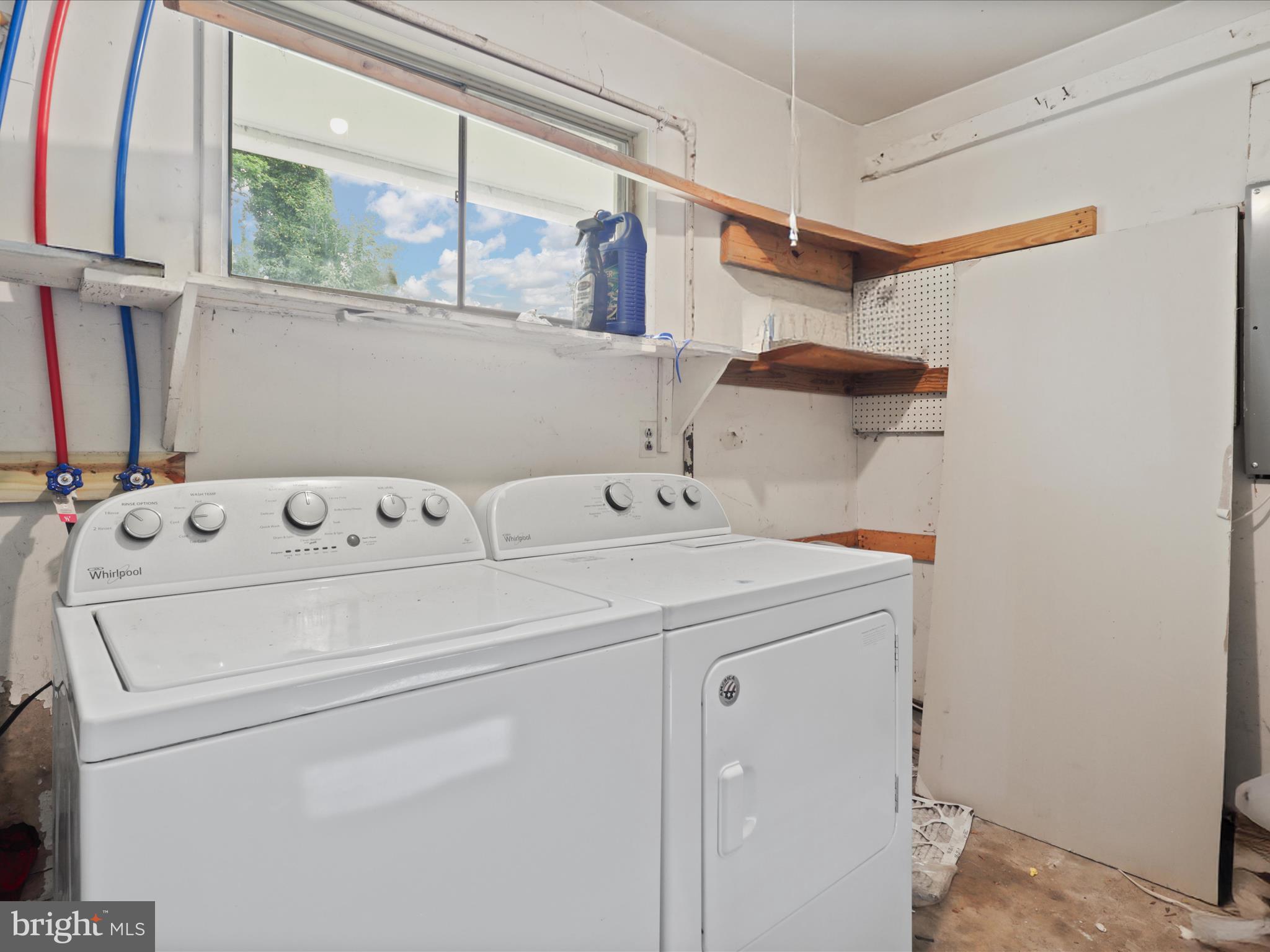 7435 Bath Street Springfield, VA 22150 - Photo 13 of 28 a utility room with dryer and washer