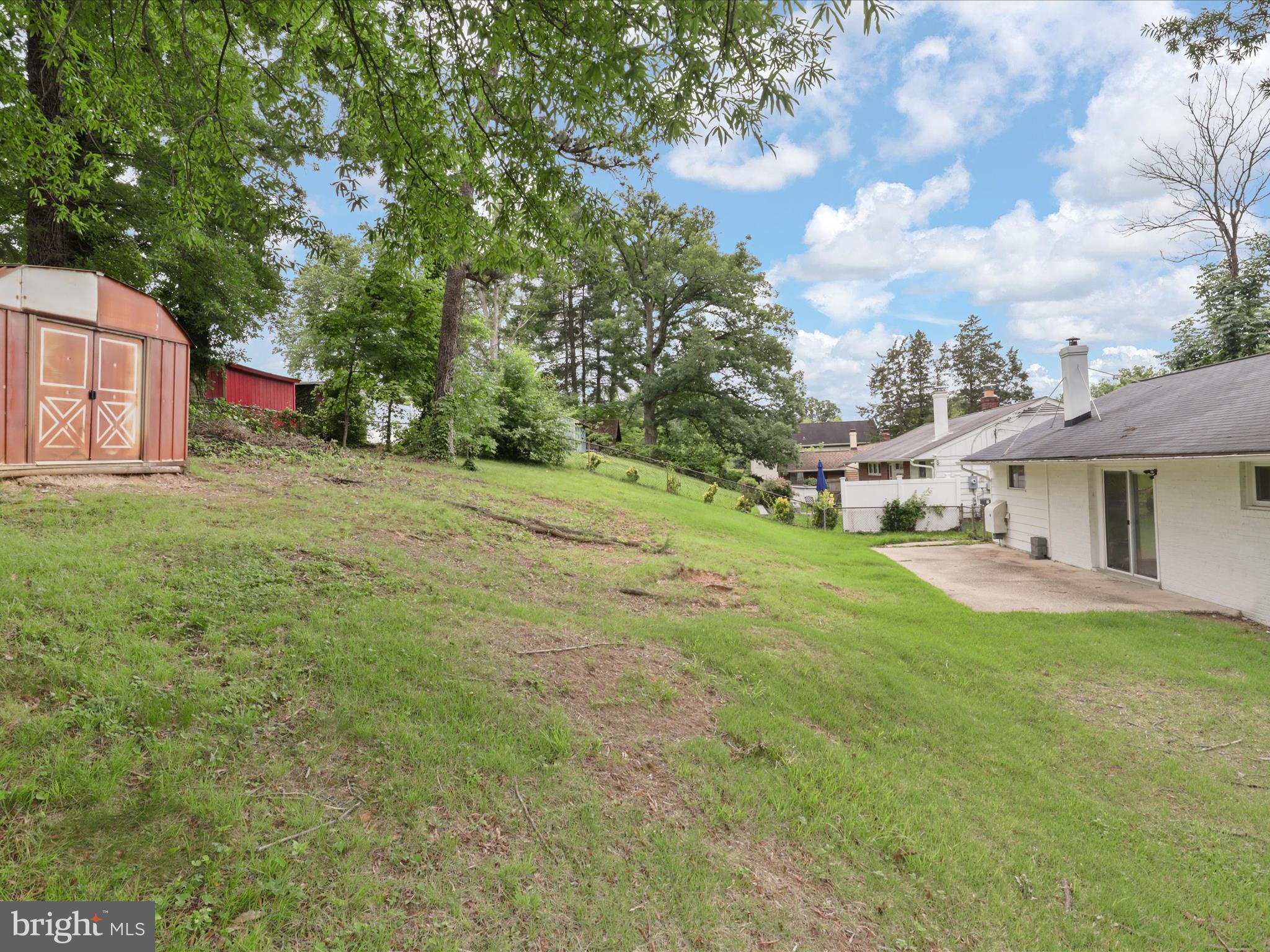 7435 Bath Street Springfield, VA 22150 - Photo 22 of 28 a front view of a house with a garden
