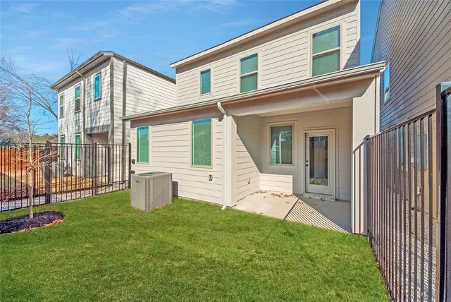 a front view of house with yard and outdoor seating