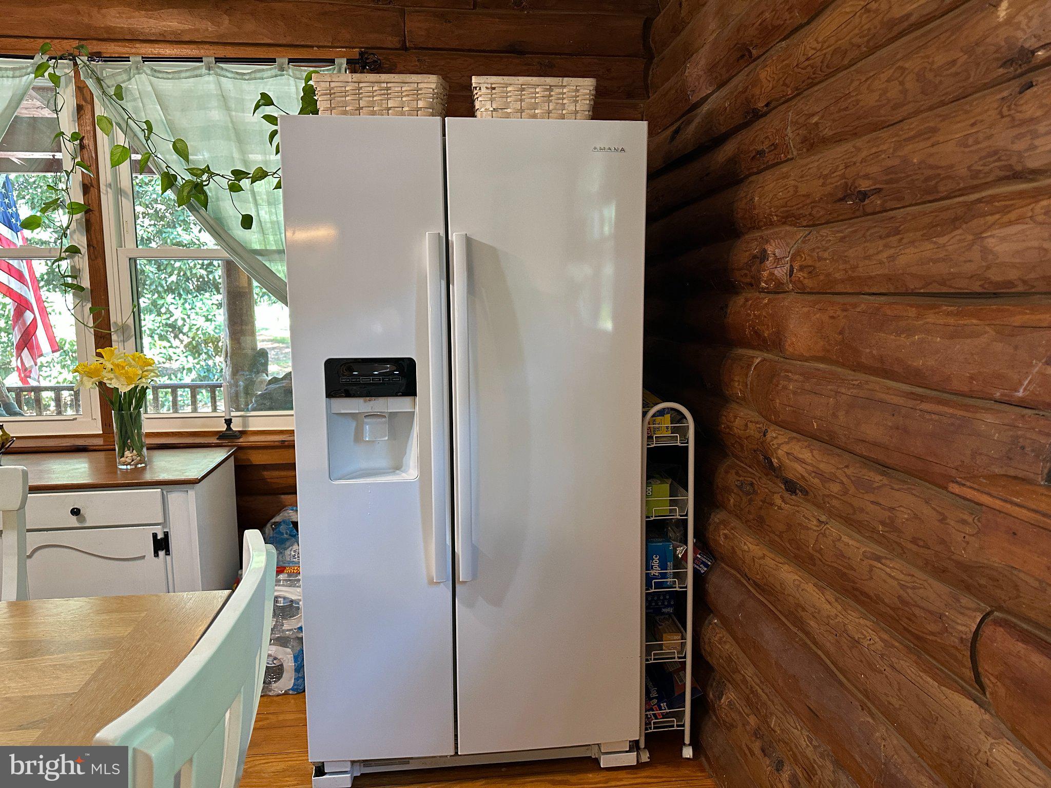28407 Old Eden Road Eden, MD 21822 - Photo 21 of 48 a close view of a sink a stove and a refrigerator in a kitchen