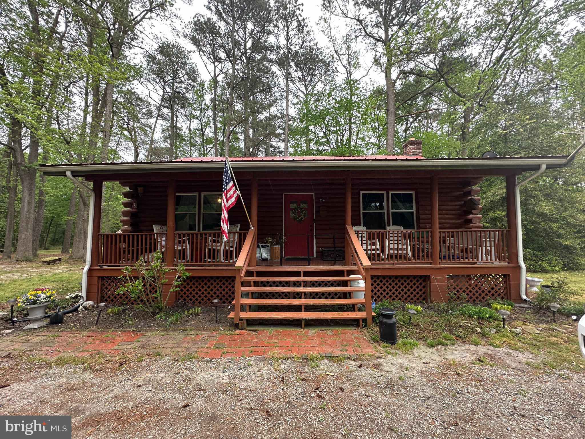 28407 Old Eden Road Eden, MD 21822 - Photo 3 of 48 a front view of a house with porch and furniture