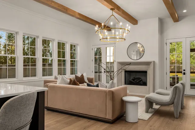 a kitchen with kitchen island granite countertop a sink a counter space and stainless steel appliances