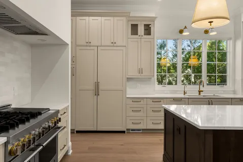 a bedroom with a bed couch and window