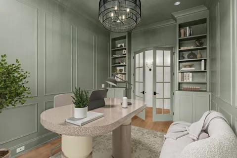 a large kitchen with a table and chairs