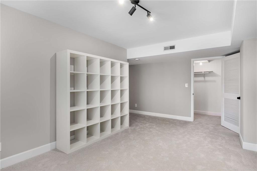 3240 Pinestream Road Northwest Atlanta, GA 30327 - Photo 33 of 42 a view of an empty room with a window