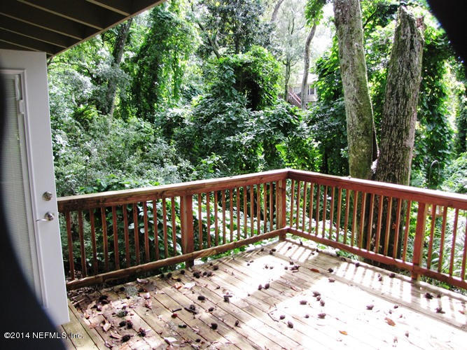 6442 Ferber Road Jacksonville, FL 32277 - Photo 20 of 22 a view of balcony with wooden floor