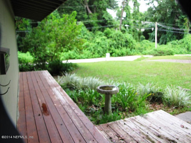 6442 Ferber Road Jacksonville, FL 32277 - Photo 2 of 22 a view of a backyard with plants