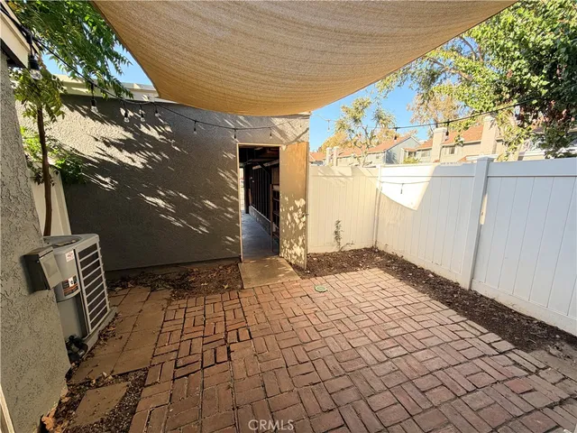 a view of a backyard of the house