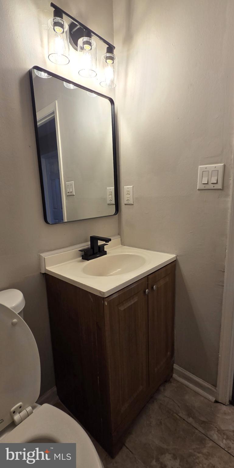 3 Linden Court Sicklerville, NJ 08081 - Photo 20 of 31 a bathroom with a sink and mirror