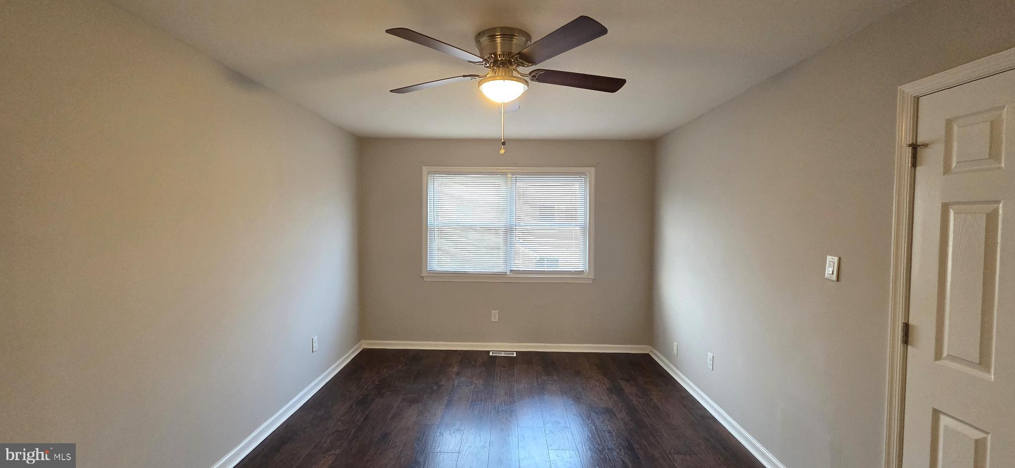 3 Linden Court Sicklerville, NJ 08081 - Photo 25 of 31 an empty room with wooden floor and windows