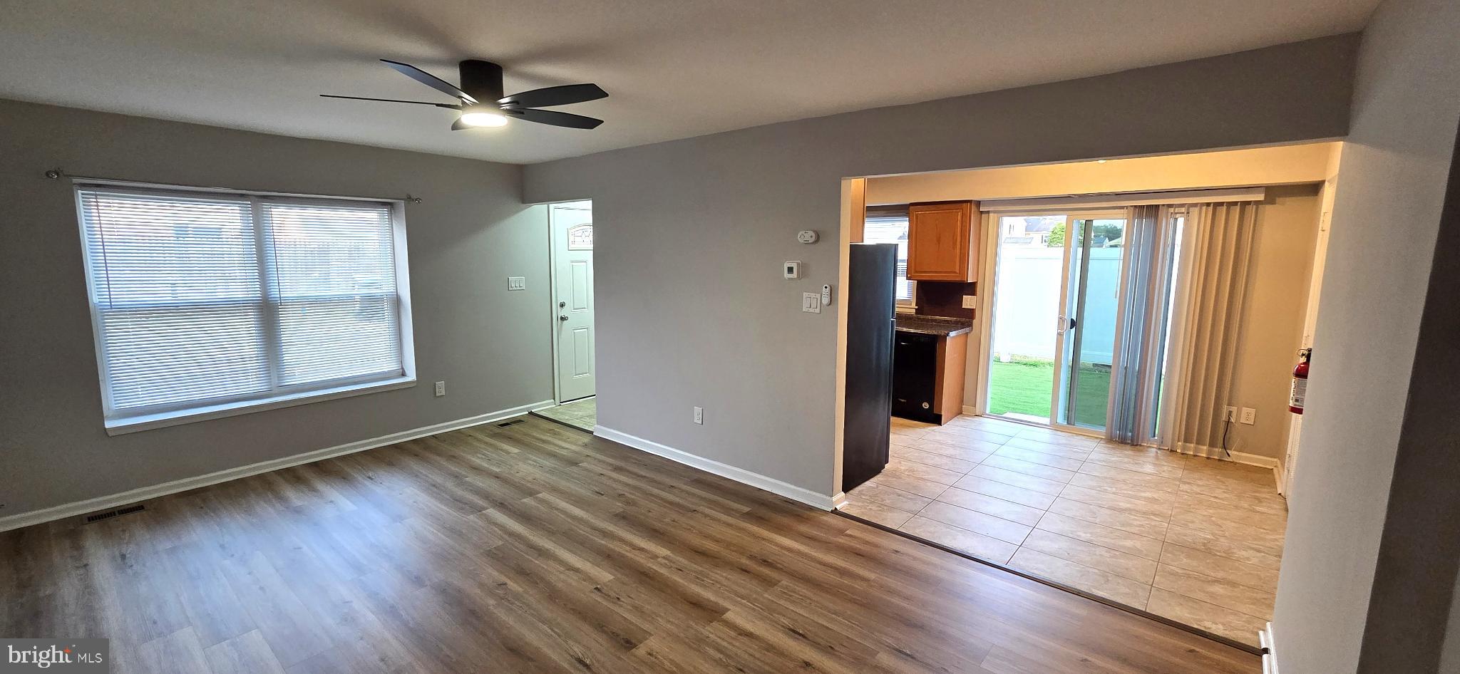 3 Linden Court Sicklerville, NJ 08081 - Photo 8 of 31 an empty room with wooden floor and windows