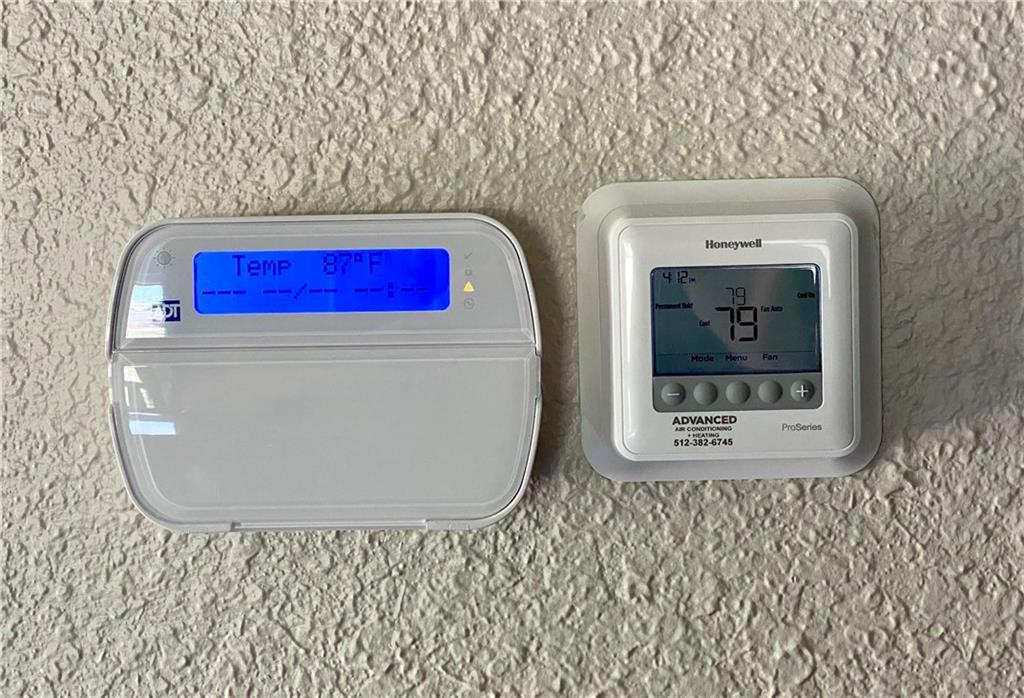 1715 Shadowview Drive, Unit B Austin, TX 78758 - Photo 22 of 28 Maintain ideal comfort with the smart thermostat and integrated home security panel.
