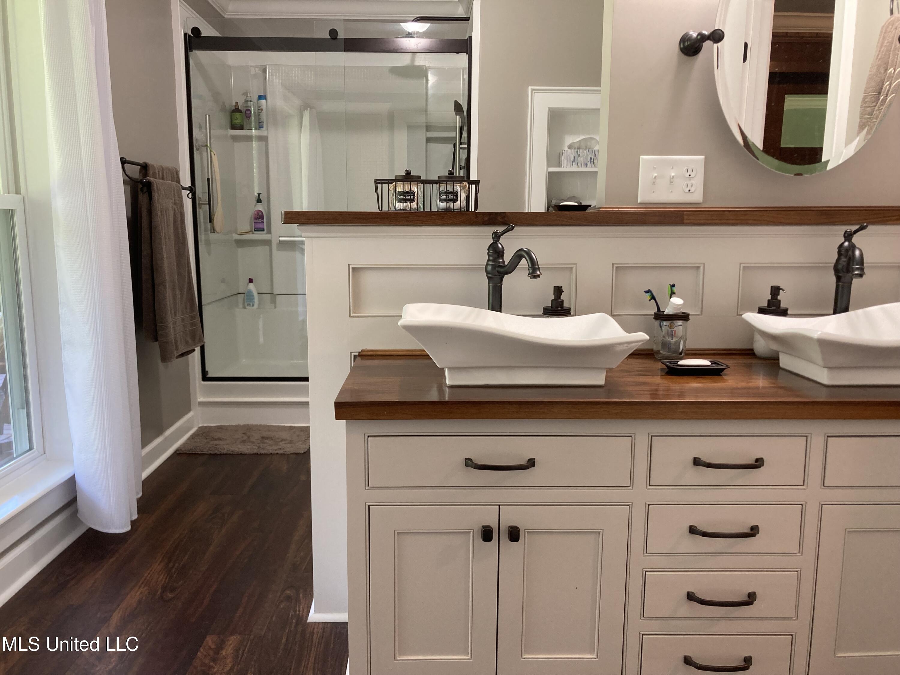 300 Bob White Lane Ridgeland, MS 39157 - Photo 14 of 32 14 Bath Master vanity and shower