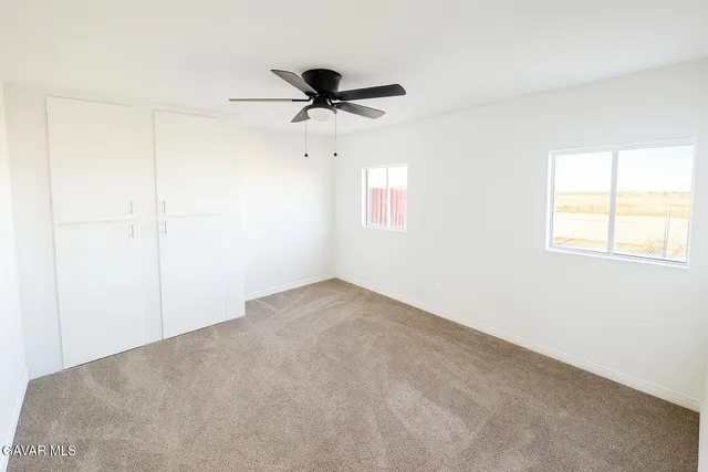 a view of a terrace with lake view and mountain view