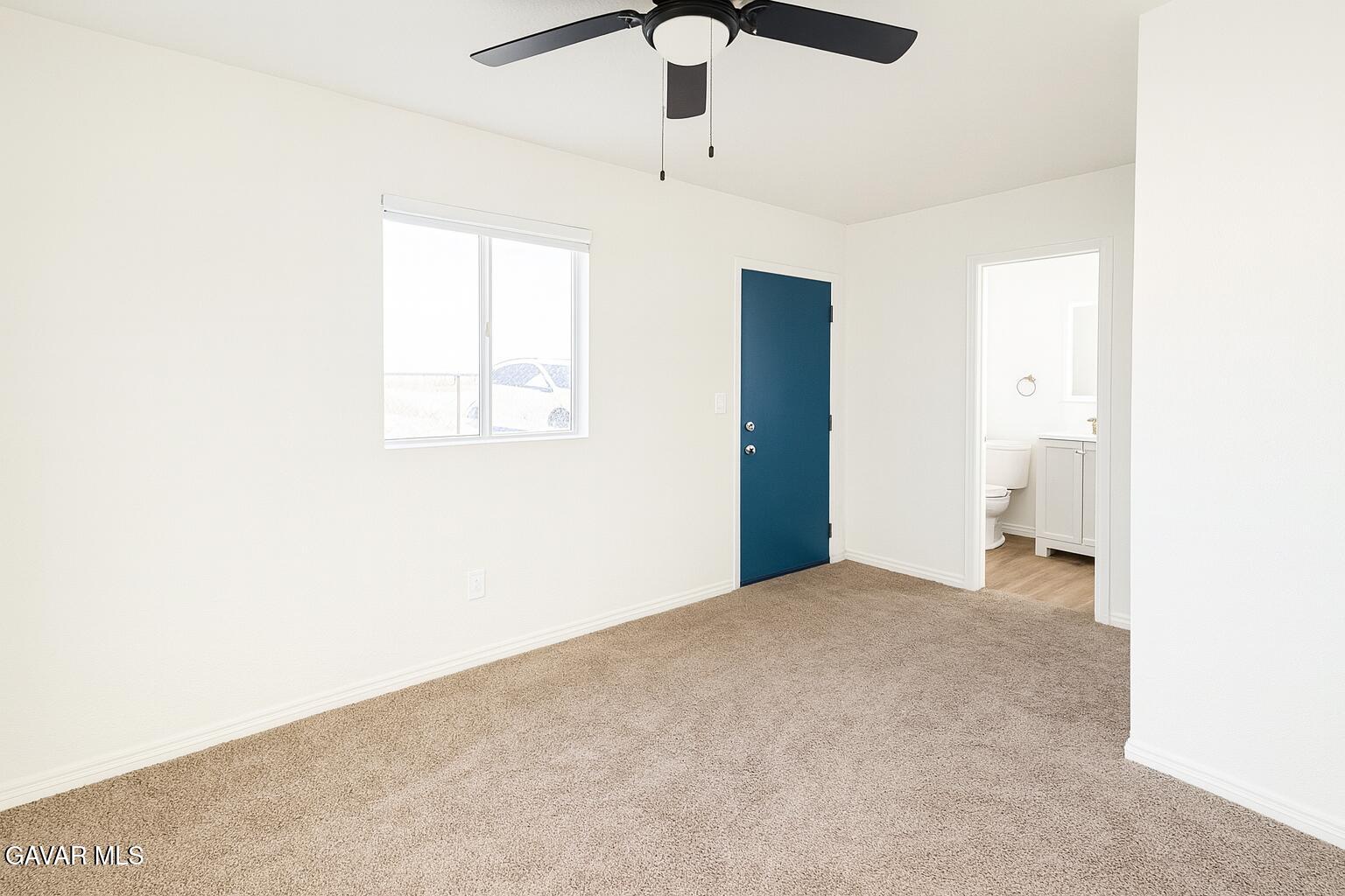 8445 Gaskell Road Rosamond, CA 93560 - Photo 10 of 13 a view of an empty room with a window