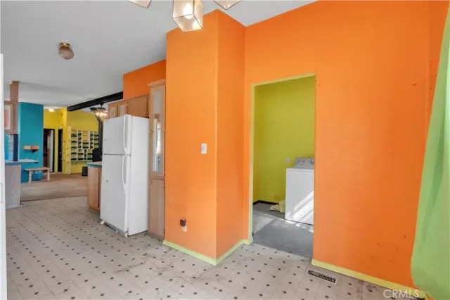 a view of a bathroom with a walk in closet