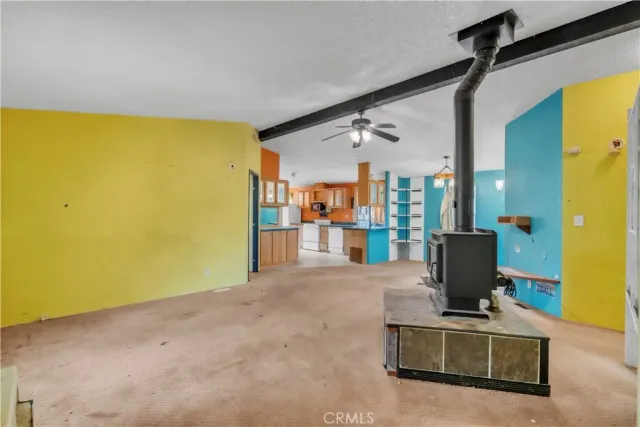 a view of a room with a large window