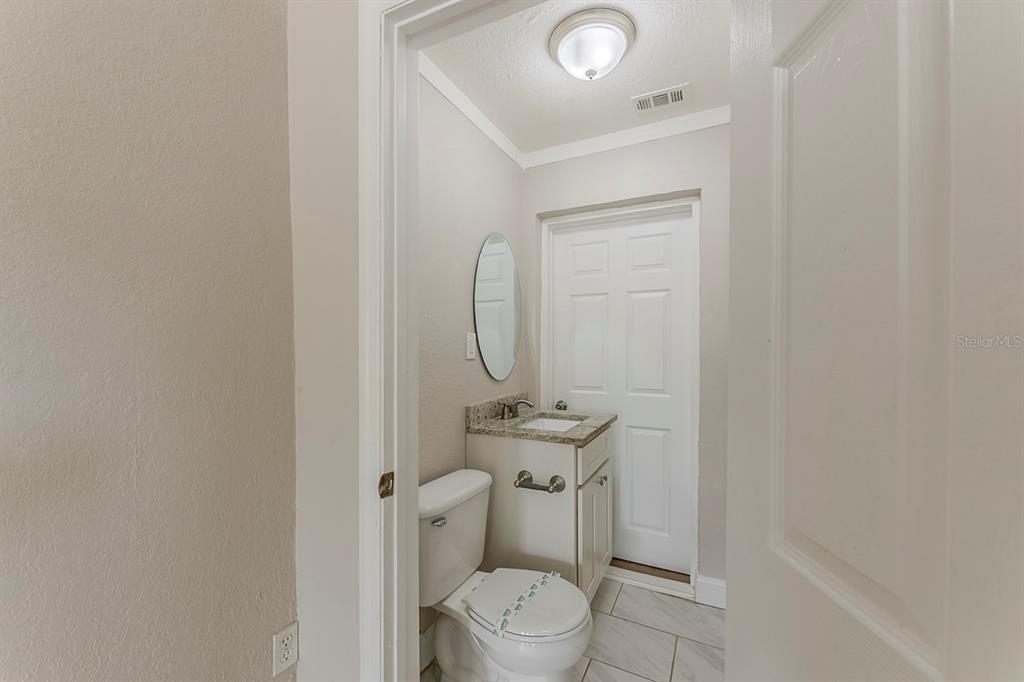 5500 Riviera Drive Orlando, FL 32808 - Photo 24 of 48 a bathroom with a toilet