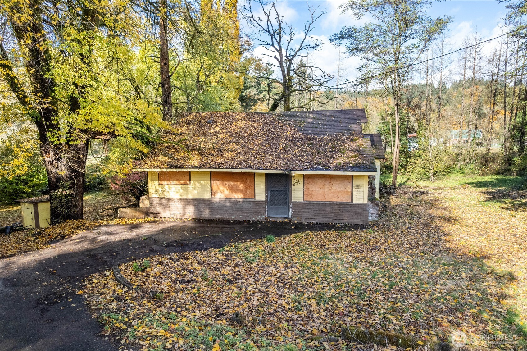2104 Delameter Road Castle Rock, WA 98611 - Photo 2 of 13 front view of a house with a yard