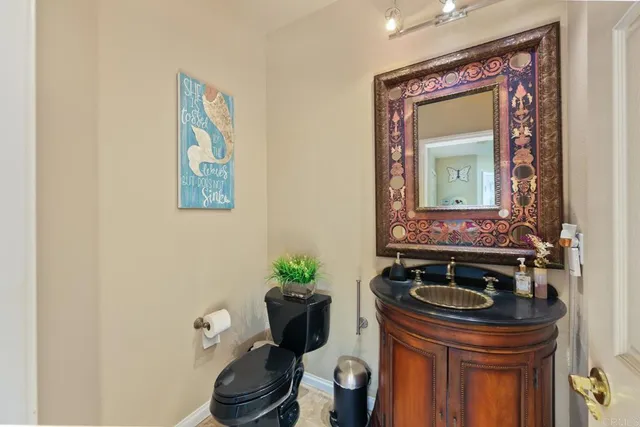 a front view of a house with a yard and a garage