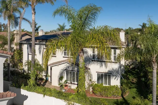 an aerial view of a city with lots of residential buildings