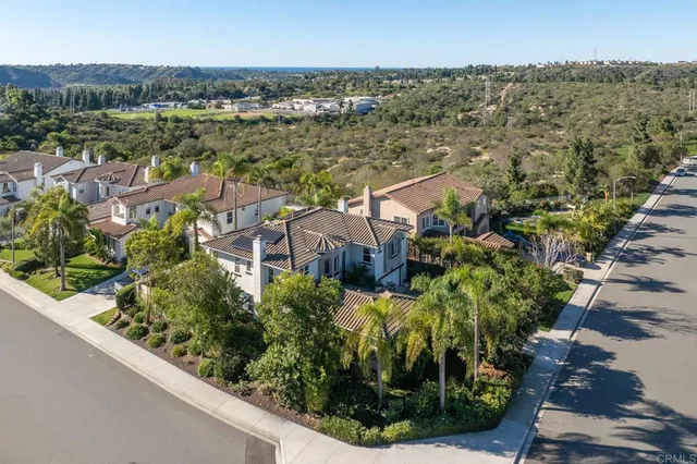 an aerial view of a city with lots of residential buildings
