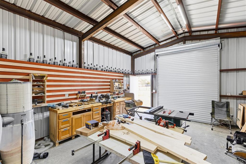 9920 County Road 540 Lavon, TX 75166 - Photo 25 of 32 a view of a kitchen with appliances and cabinets