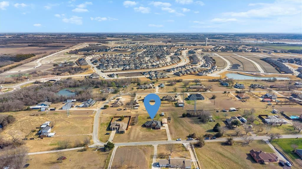 9920 County Road 540 Lavon, TX 75166 - Photo 28 of 32 an aerial view of a building with outdoor space