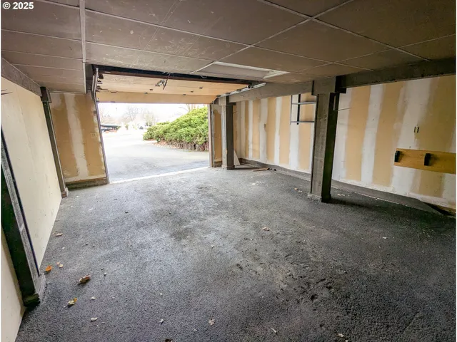 a view of a room with a large window